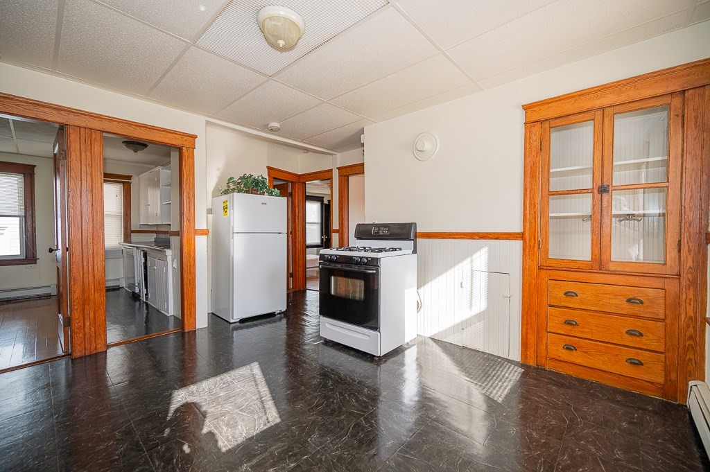 19 Fifth Avenue Worcester, MA 01607 - Photo 29 of 42 a view of kitchen with stainless steel appliances wooden floor and living room view