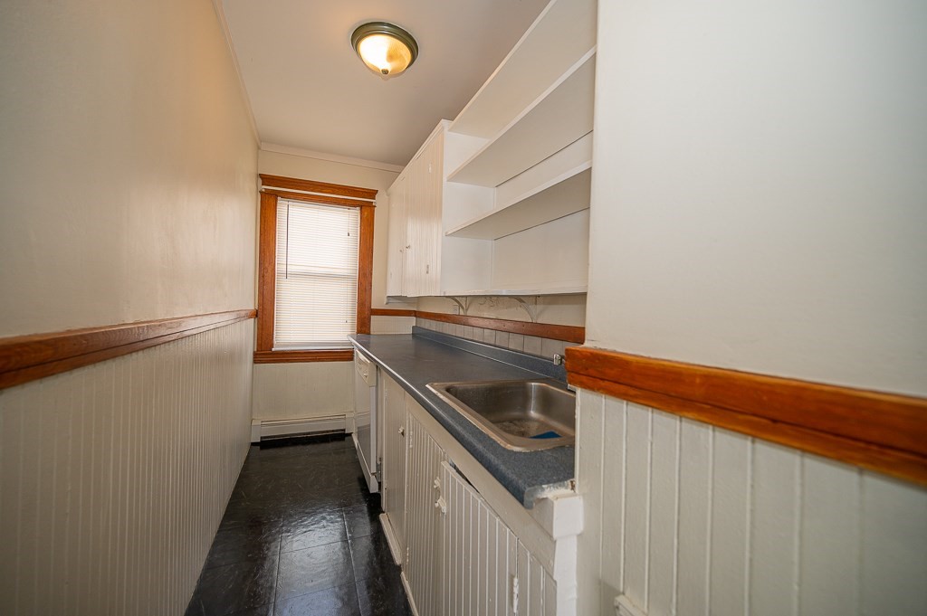 19 Fifth Avenue Worcester, MA 01607 - Photo 32 of 42 a kitchen that has a sink and a stove