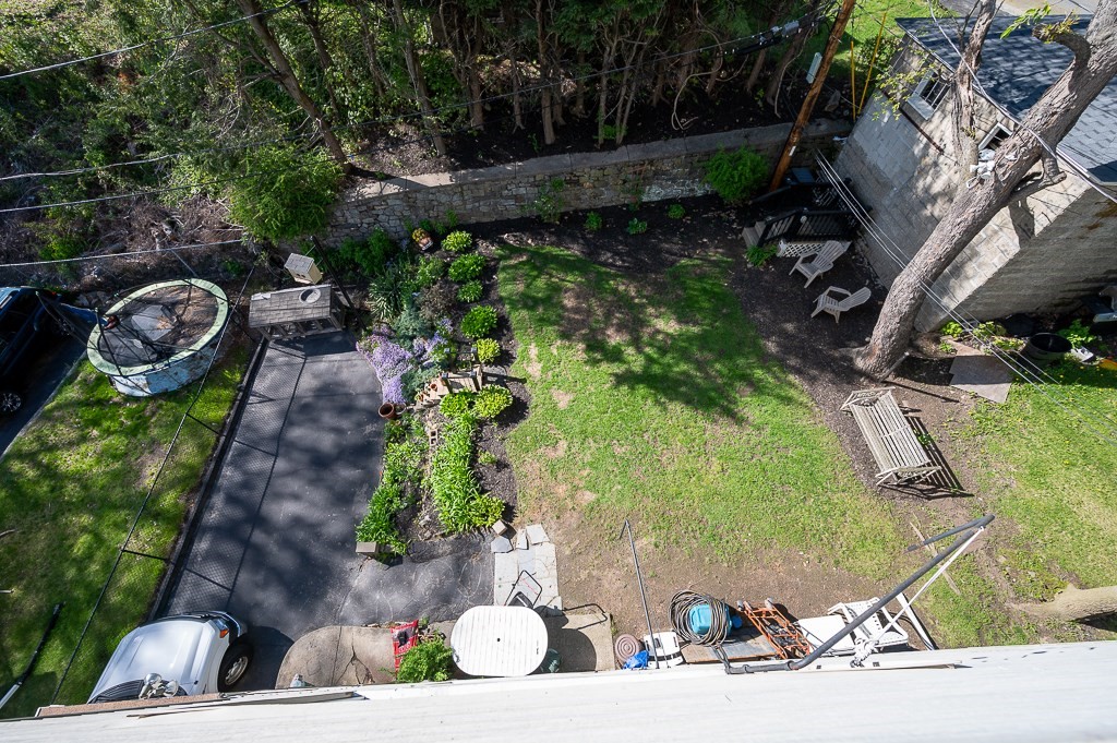 19 Fifth Avenue Worcester, MA 01607 - Photo 40 of 42 a view of a backyard with table and chairs potted plants
