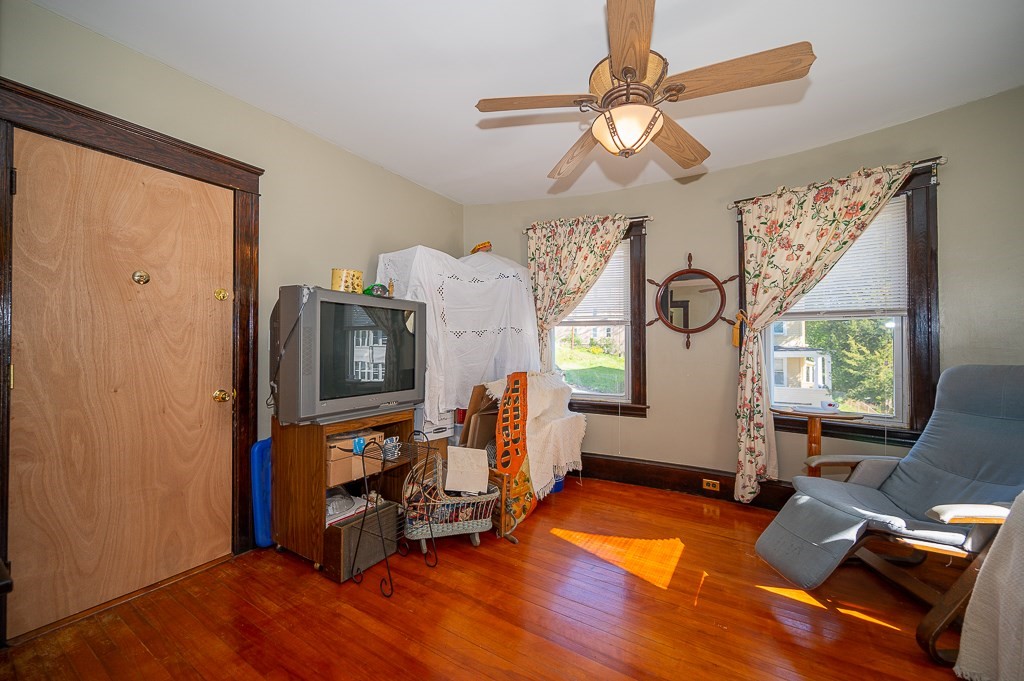 19 Fifth Avenue Worcester, MA 01607 - Photo 10 of 42 a living room with furniture and a flat screen tv