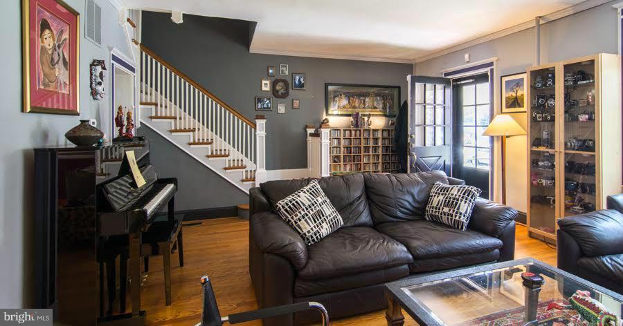 3933 Keswick Road Baltimore, MD 21211 - Photo 2 of 21 a living room with furniture and a window