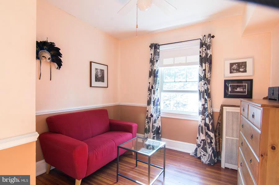 3933 Keswick Road Baltimore, MD 21211 - Photo 10 of 21 a living room with furniture and a window