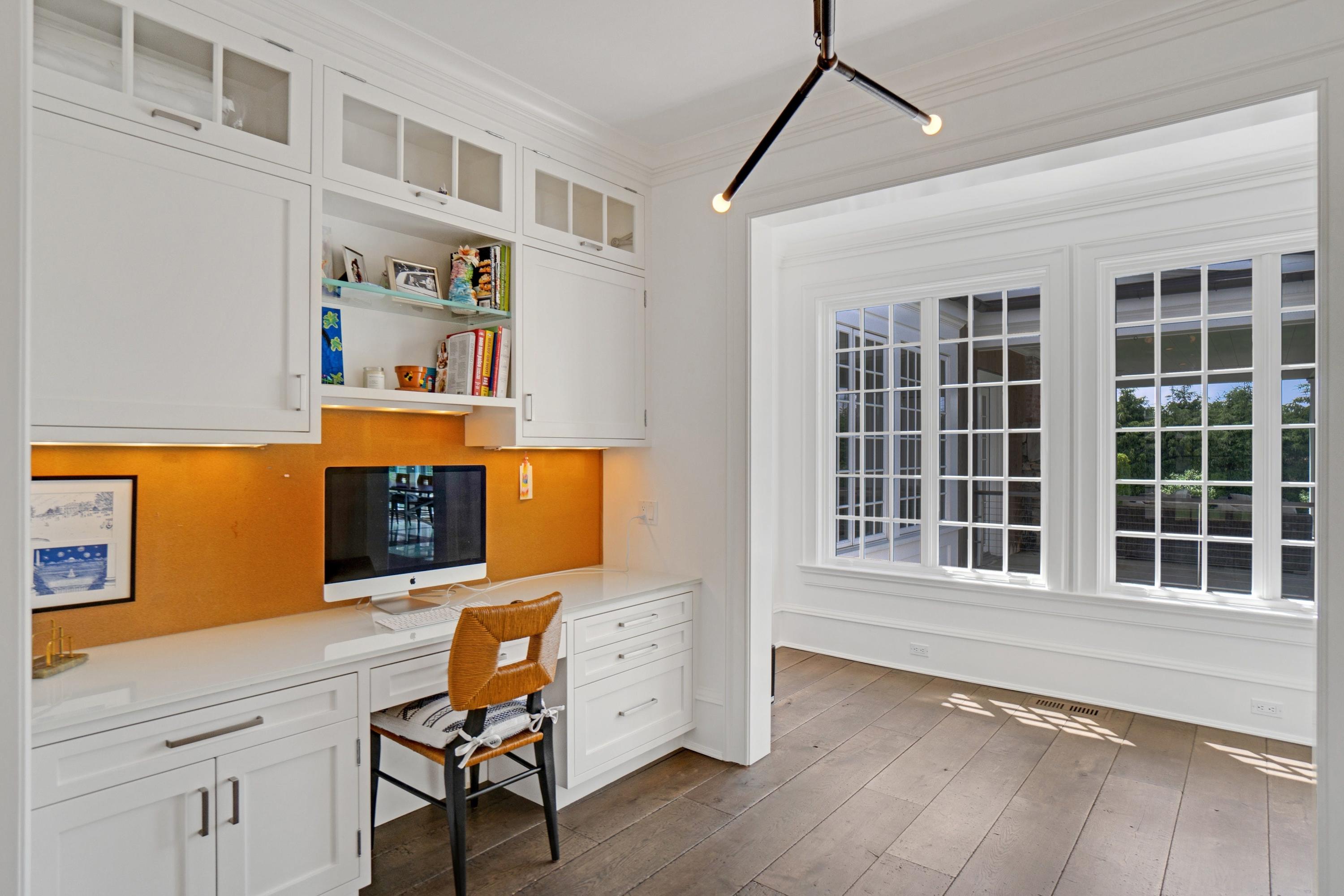 90 Long Neck Point Road Darien, CT 06820 - Photo 15 of 37 a view of an entryway with wooden floor and a window