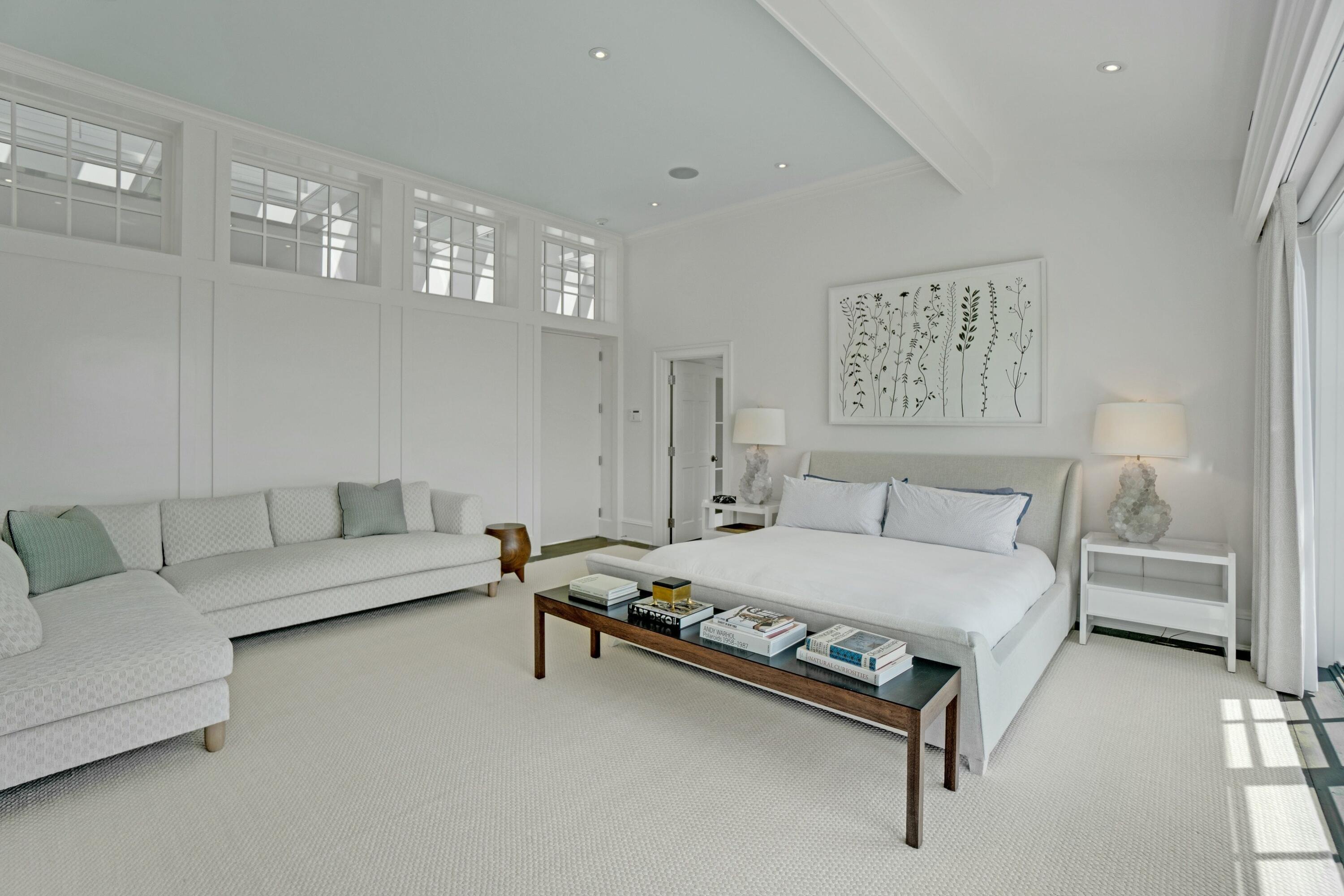 90 Long Neck Point Road Darien, CT 06820 - Photo 21 of 37 a bedroom with a bed and furniture