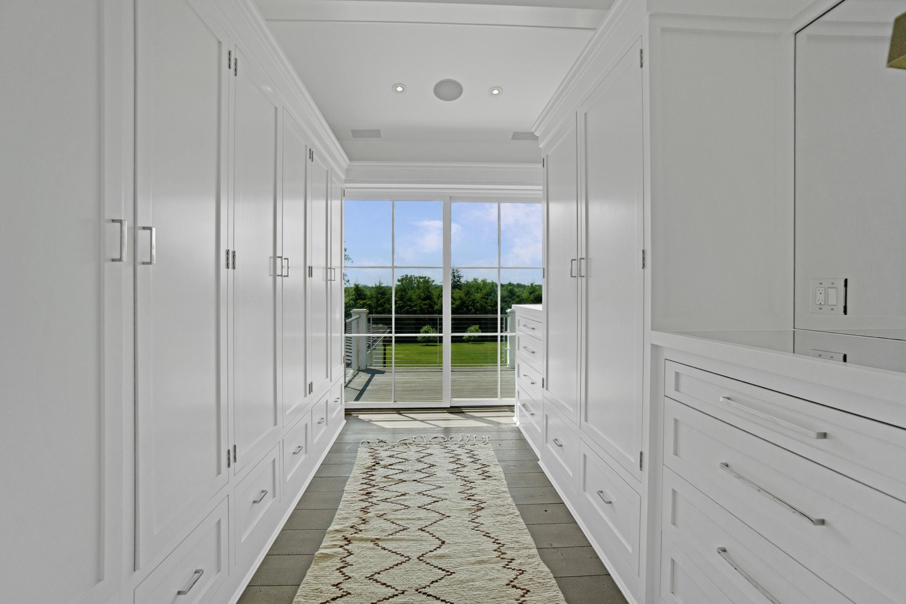 90 Long Neck Point Road Darien, CT 06820 - Photo 22 of 37 a view of a hallway