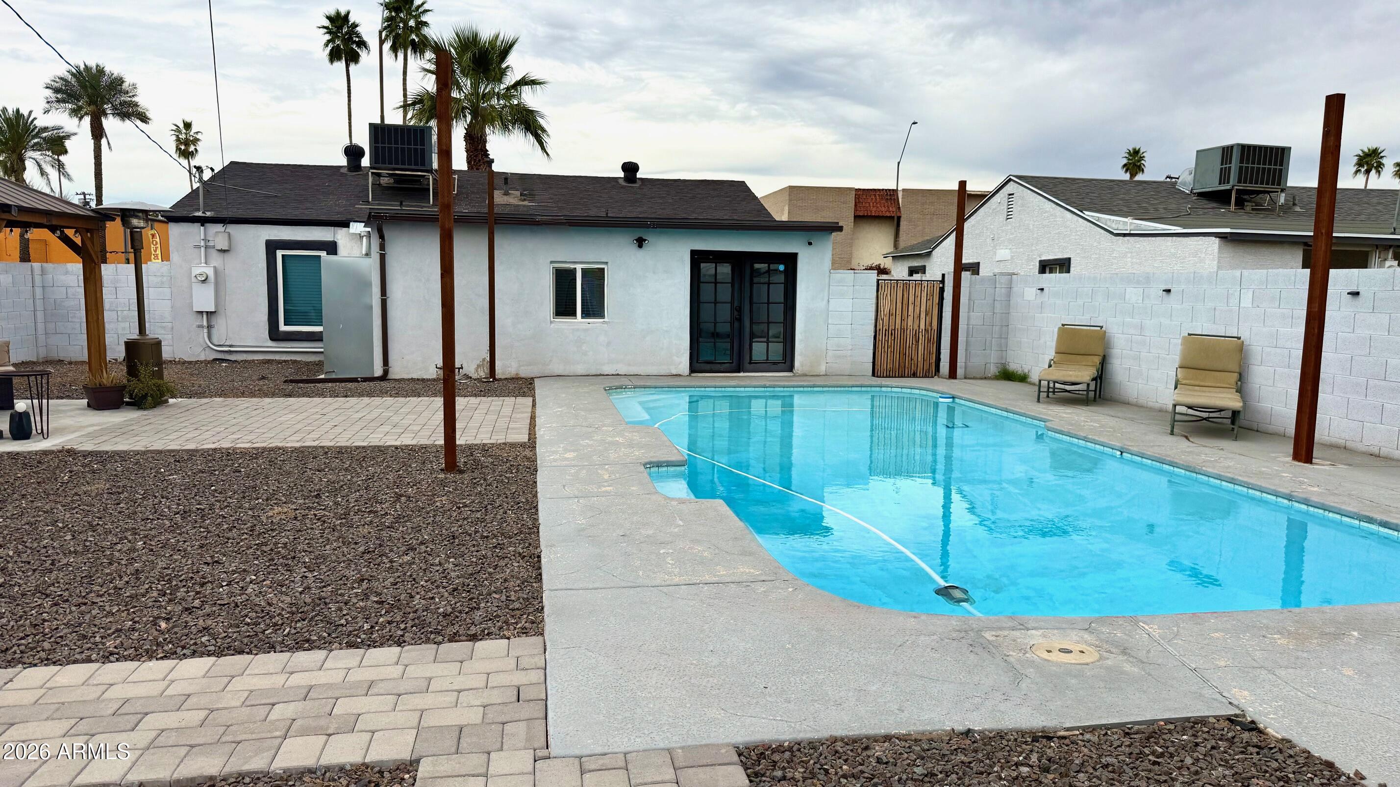 1109 West Indian School Road Phoenix, AZ 85013 - Photo 29 of 38 a view of a house with a patio