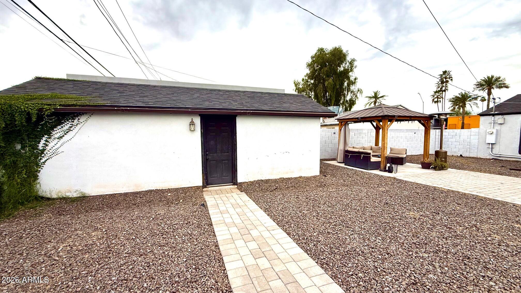 1109 West Indian School Road Phoenix, AZ 85013 - Photo 35 of 38 a house view with a outdoor space