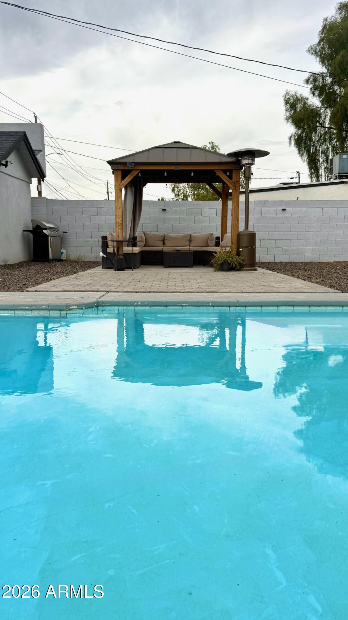 1109 West Indian School Road Phoenix, AZ 85013 - Photo 37 of 38 a view of a living room and kitchen