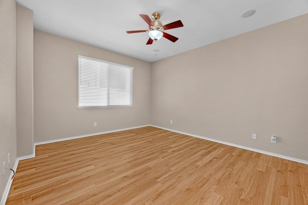 785 West Riviera Lane Clovis, CA 93619 - Photo 18 of 35 wooden floor in an empty room with a window