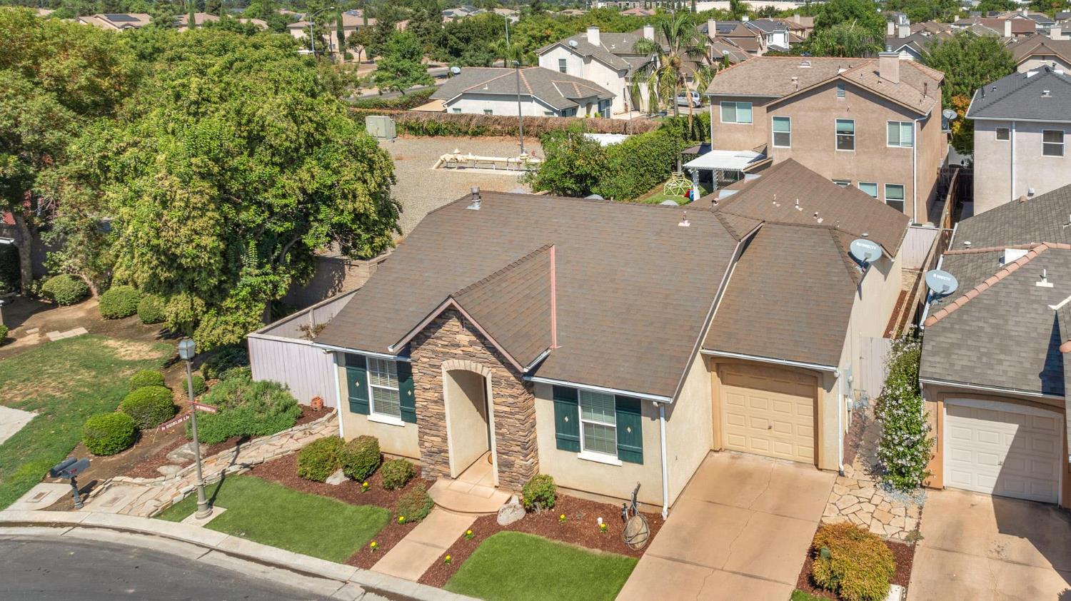 785 West Riviera Lane Clovis, CA 93619 - Photo 4 of 35 an aerial view of residential houses with outdoor space