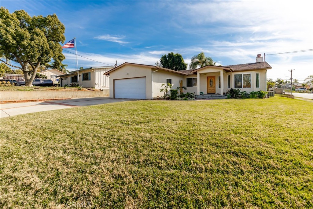 1139 East Fallbrook Street Fallbrook, CA 92028 - Photo 1 of 1 a front view of a house with a yard