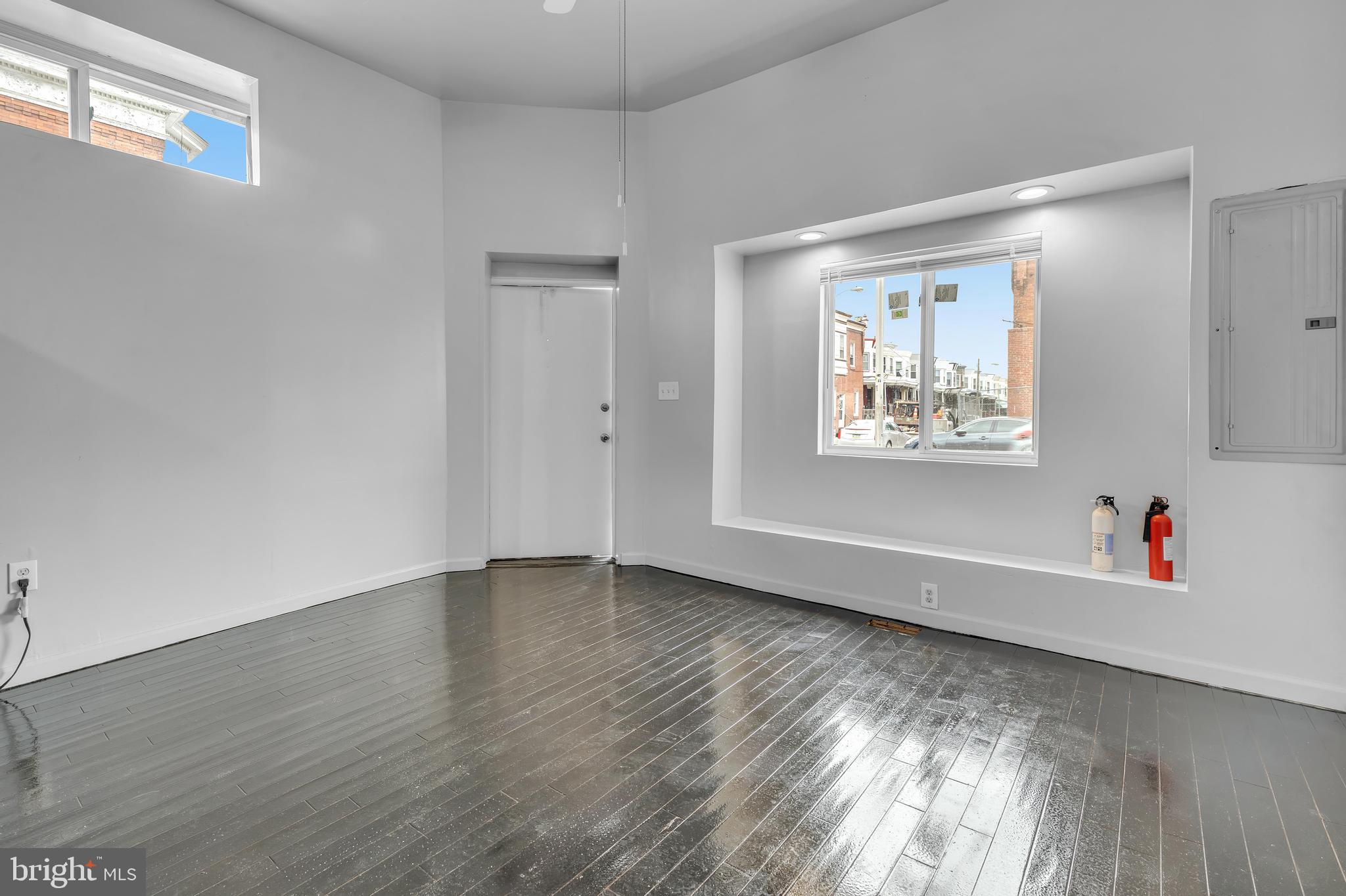 434 South 56th Street, Unit A Philadelphia, PA 19143 - Photo 13 of 19 a view of an empty room and wooden floor