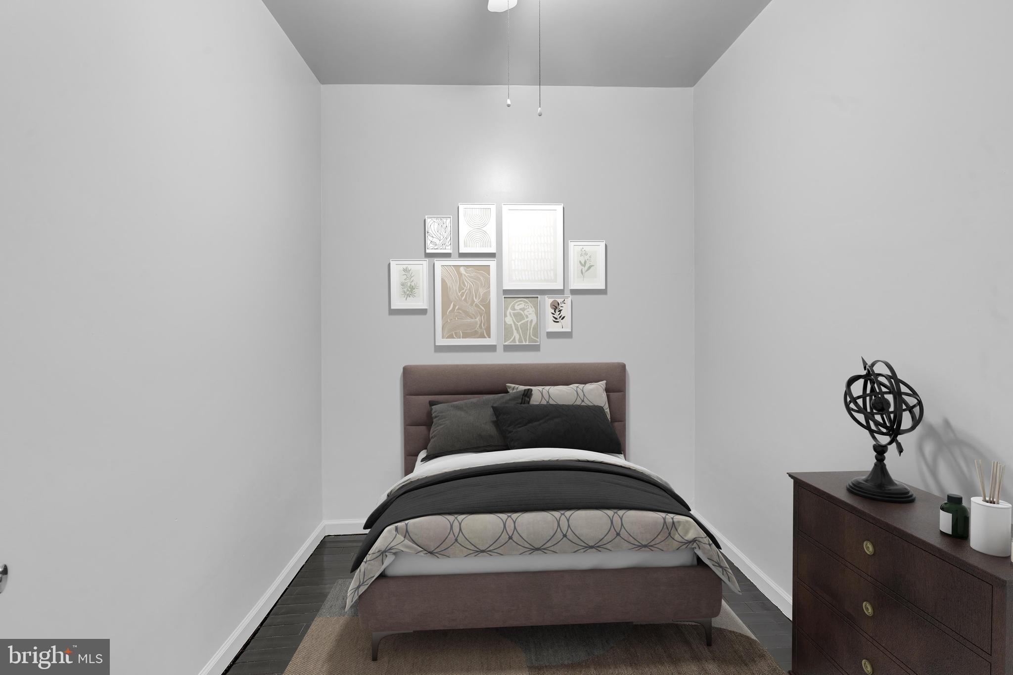 434 South 56th Street, Unit A Philadelphia, PA 19143 - Photo 6 of 19 a bedroom with a bed and window