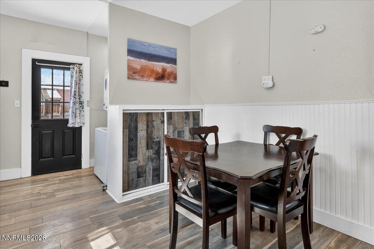 317 South Center Street Yerington, NV 89447 - Photo 11 of 27 a view of a dining room with furniture and wooden floor