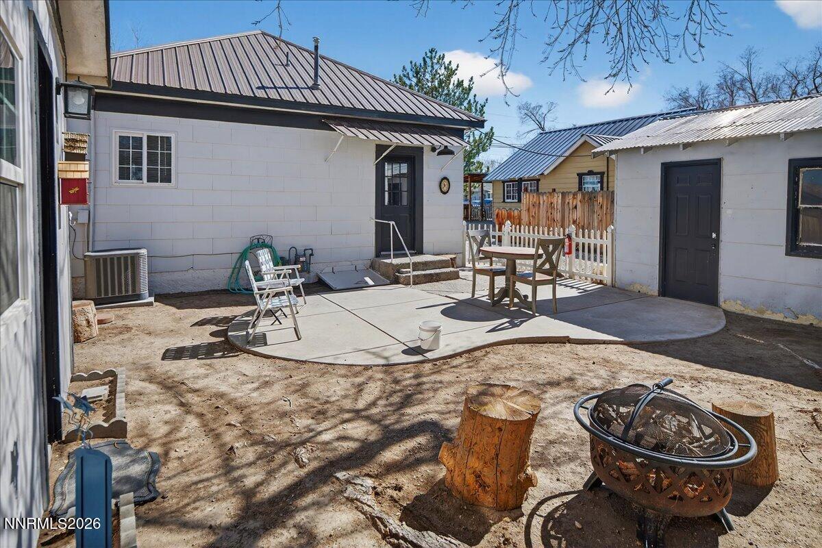 317 South Center Street Yerington, NV 89447 - Photo 22 of 27 a view of a dinning table and chairs in the patio