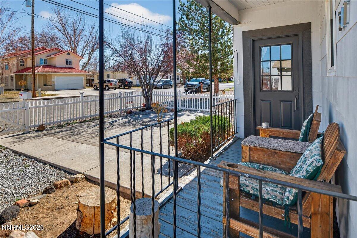 317 South Center Street Yerington, NV 89447 - Photo 5 of 27 a view of balcony with wooden floor and outdoor seating
