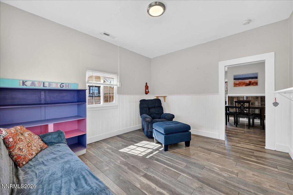 317 South Center Street Yerington, NV 89447 - Photo 8 of 27 a living room with furniture and a wooden floor