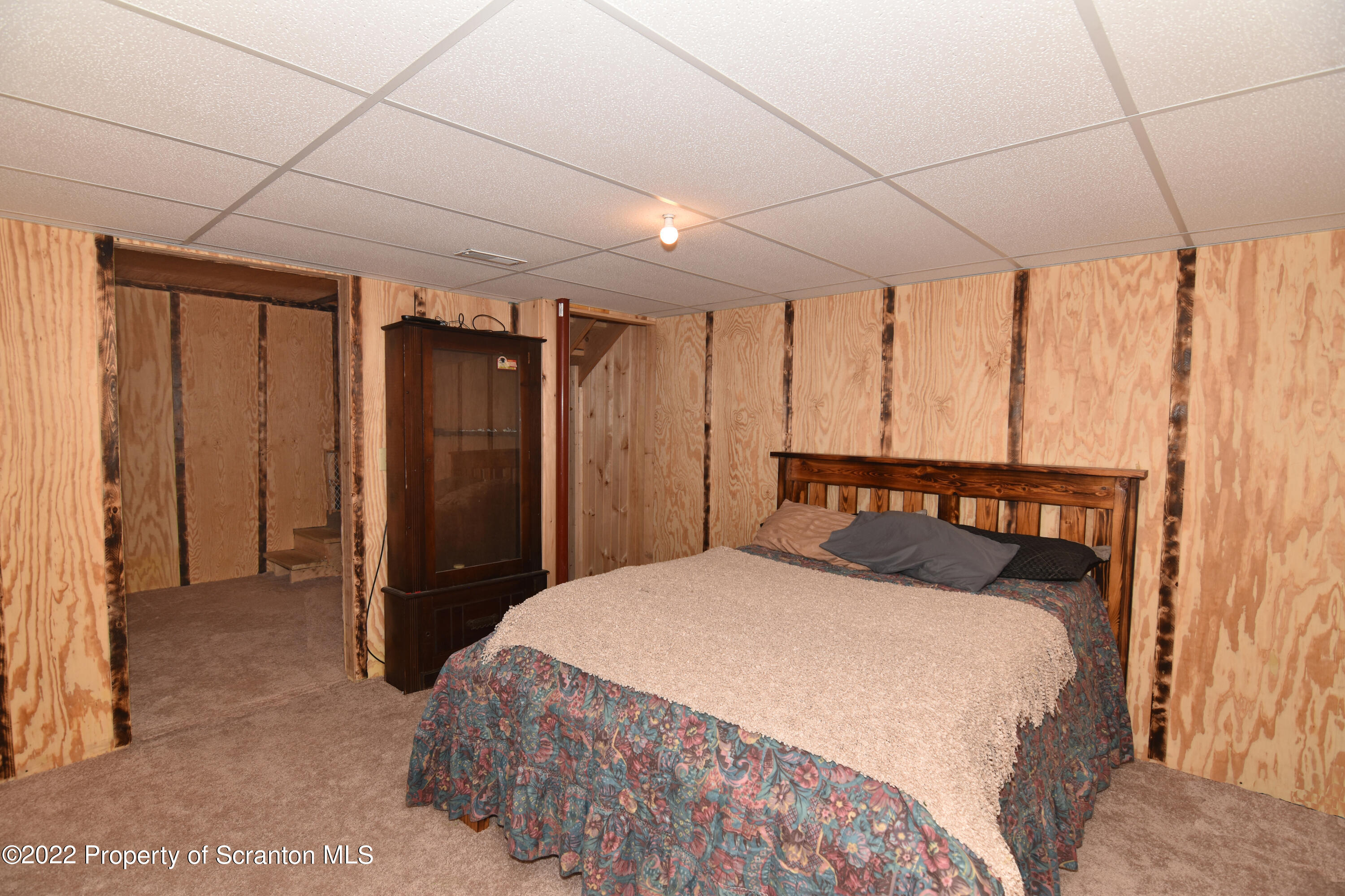 209 Oliver Road Meshoppen, PA 18630 - Photo 20 of 24 a bedroom with a bed a table and a closet
