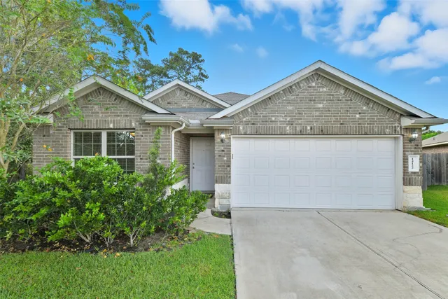 a house view with a garden space