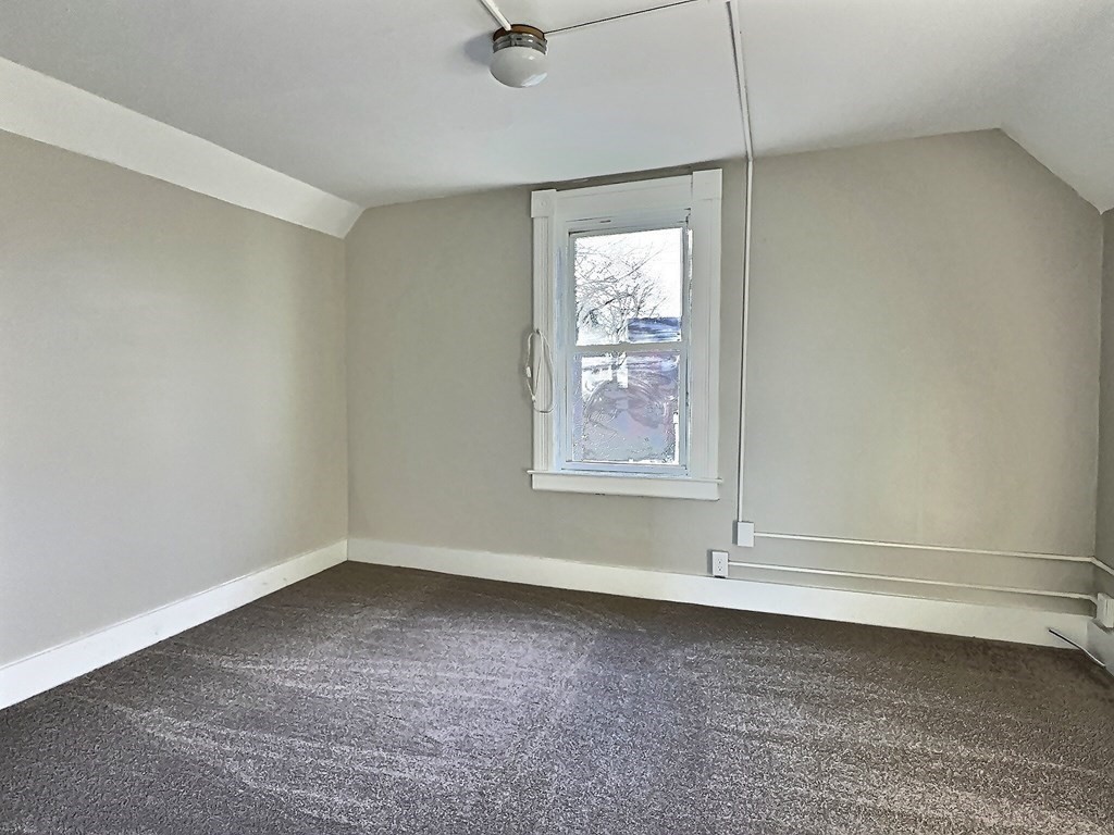 83 Oak Street Springfield, MA 01151 - Photo 15 of 18 an empty room with windows