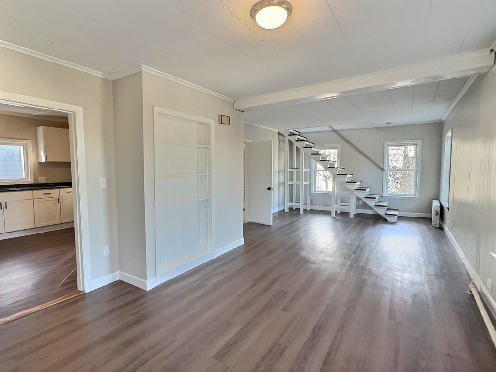 83 Oak Street Springfield, MA 01151 - Photo 5 of 18 a view of empty room with wooden floor