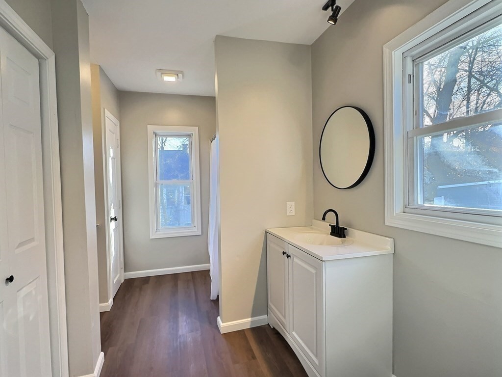 83 Oak Street Springfield, MA 01151 - Photo 6 of 18 a bathroom with a sink and a mirror