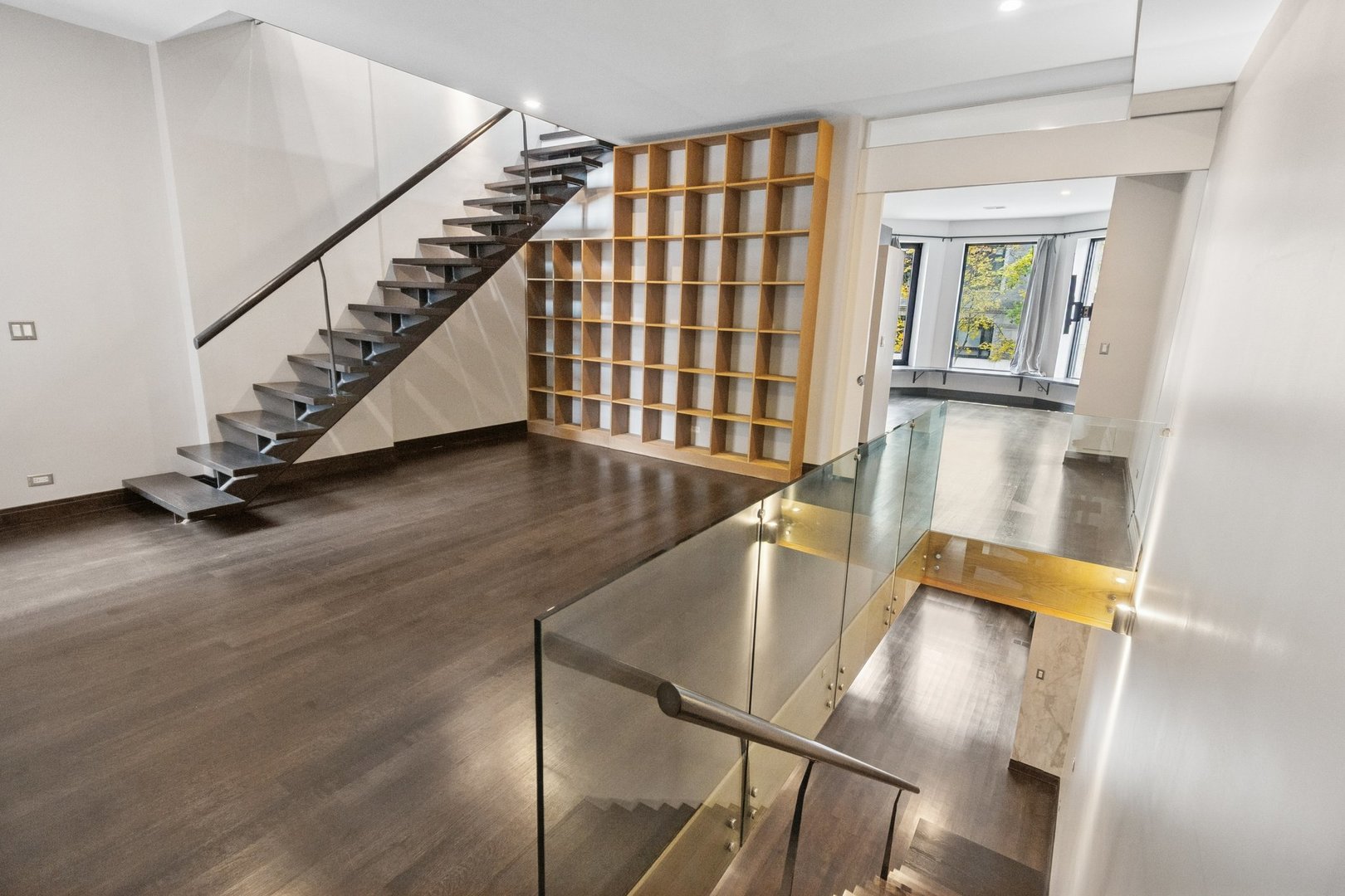 44 East Cedar Street Chicago, IL 60611 - Photo 14 of 35 a view of entryway and hall with wooden floor