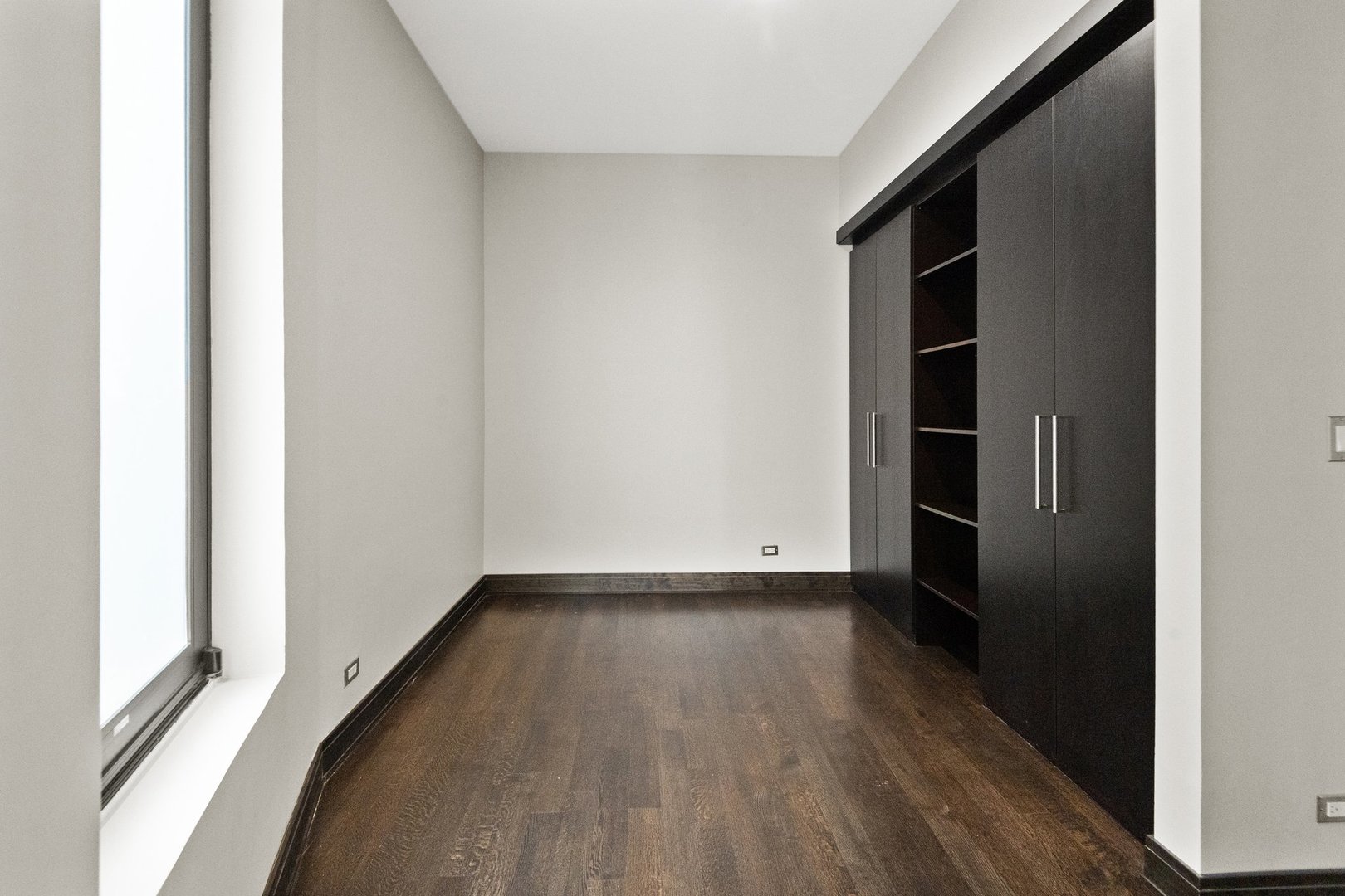 44 East Cedar Street Chicago, IL 60611 - Photo 20 of 35 a view of walk in closet with empty racks