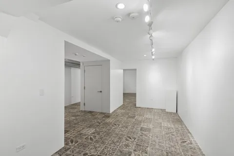 a view of a room with racks on the wall