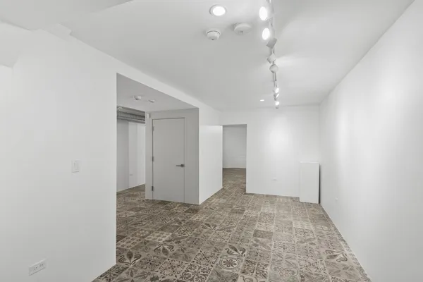 a view of a room with racks on the wall