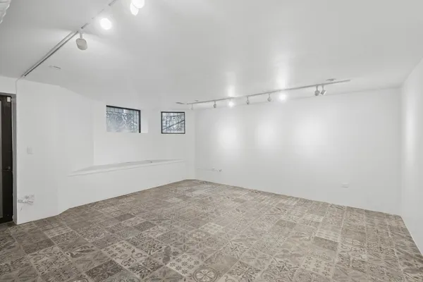 a view of a storage & utility room with wooden floor