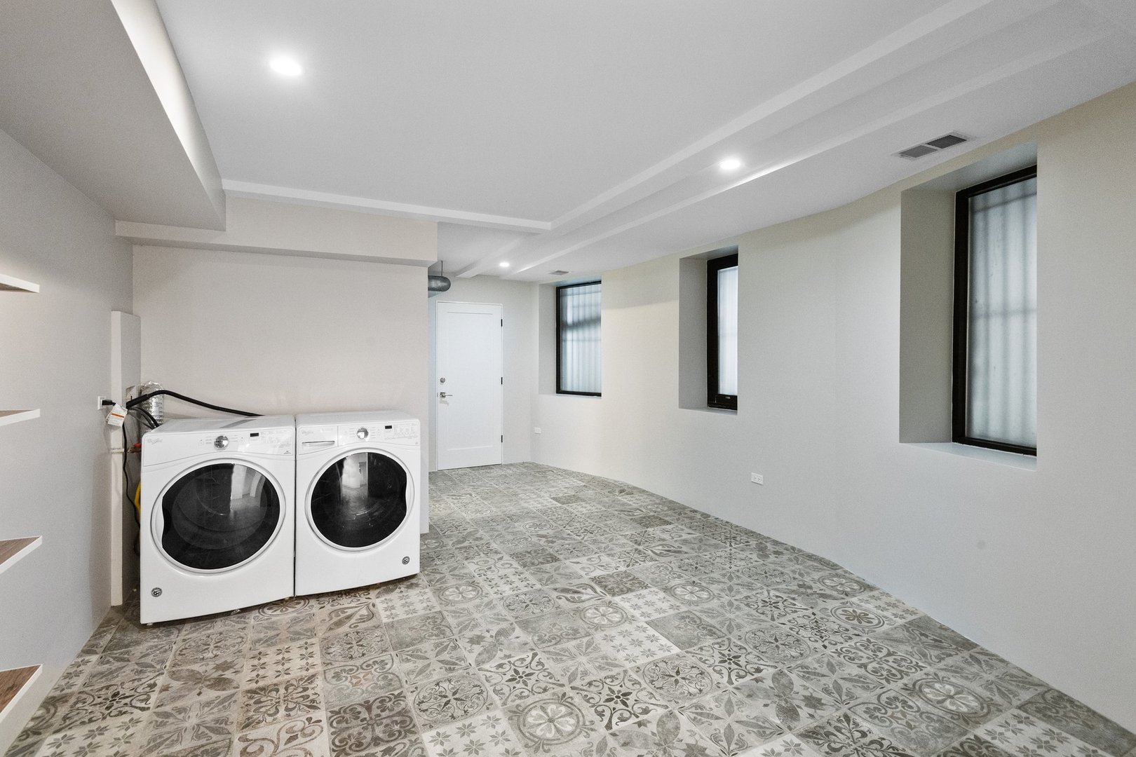 44 East Cedar Street Chicago, IL 60611 - Photo 30 of 35 a view of a storage & utility room with wooden floor