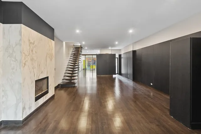 a view of entryway with wooden floor