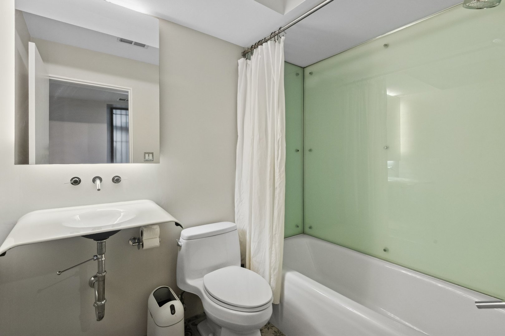 44 East Cedar Street Chicago, IL 60611 - Photo 31 of 35 a bathroom with a sink toilet and shower