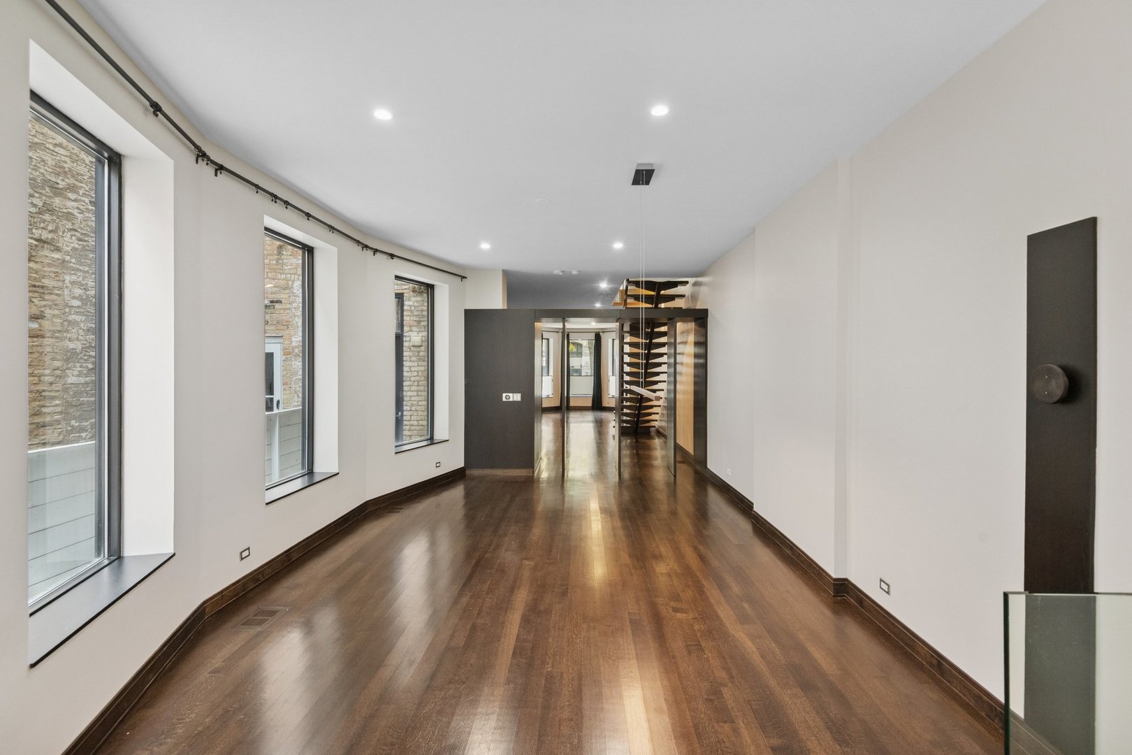 44 East Cedar Street Chicago, IL 60611 - Photo 9 of 35 a view of empty room with wooden floor