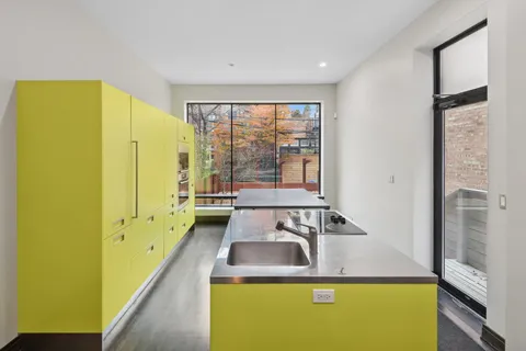 a view of a kitchen with a sink and dishwasher