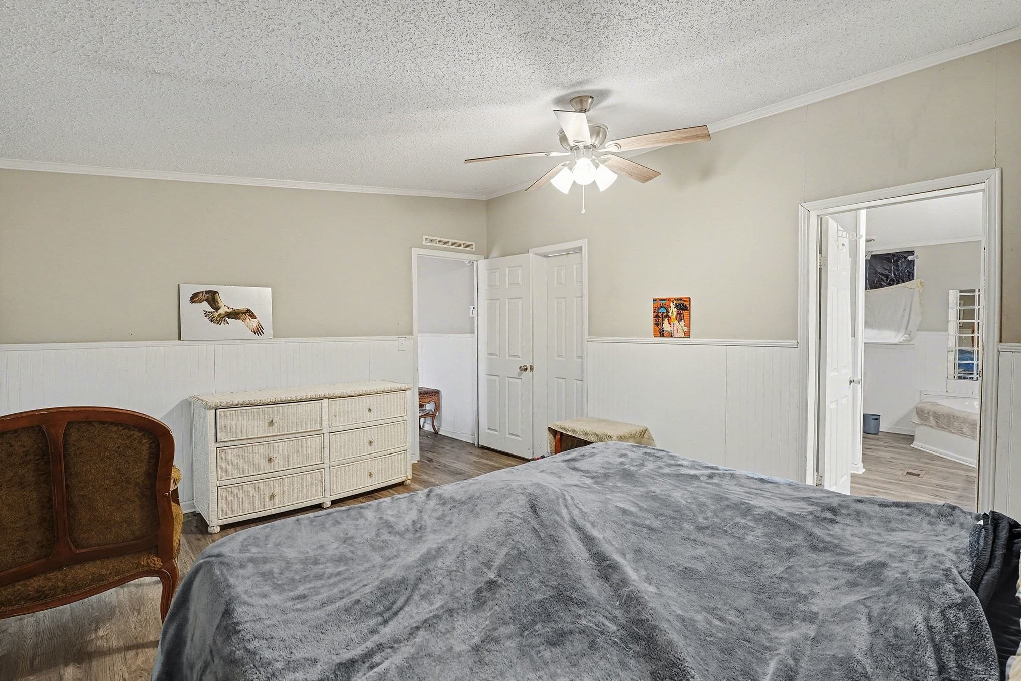 8896 Greer Road Lyles, TN 37098 - Photo 12 of 30 a bedroom with a bed and a dresser