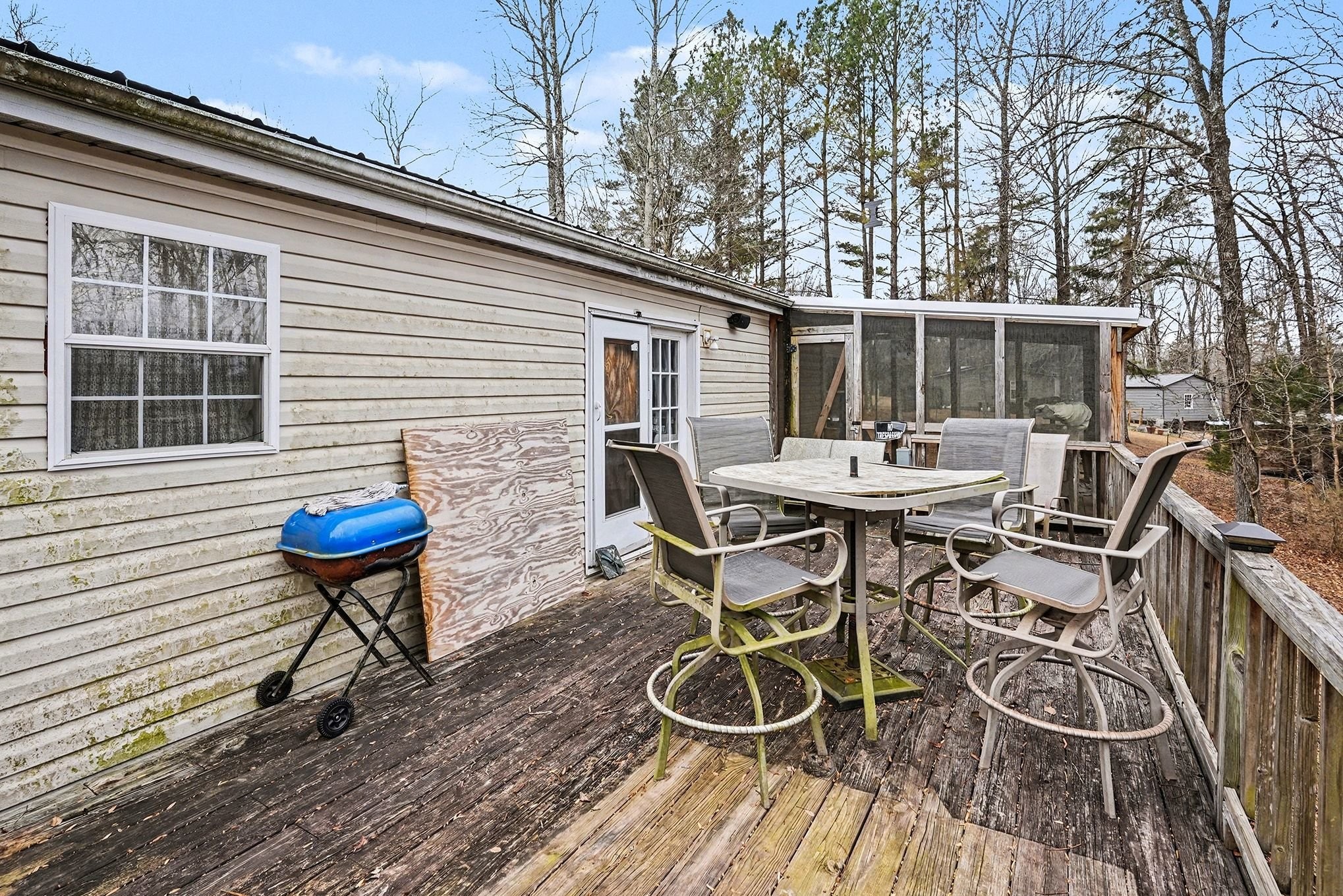 8896 Greer Road Lyles, TN 37098 - Photo 24 of 30 a view of a chairs and table in the patio