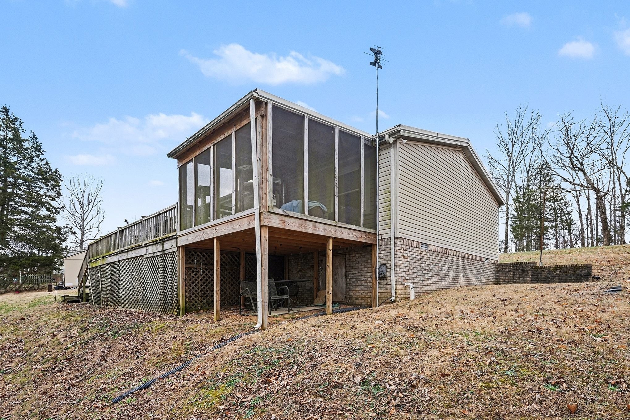8896 Greer Road Lyles, TN 37098 - Photo 26 of 30 a view of a house with a yard
