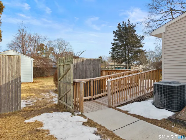 a view of a wrought iron fences in front of house