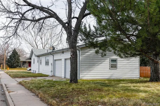 a view of a backyard of the house