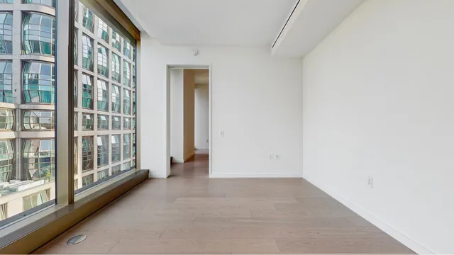 a kitchen with a stove and a refrigerator