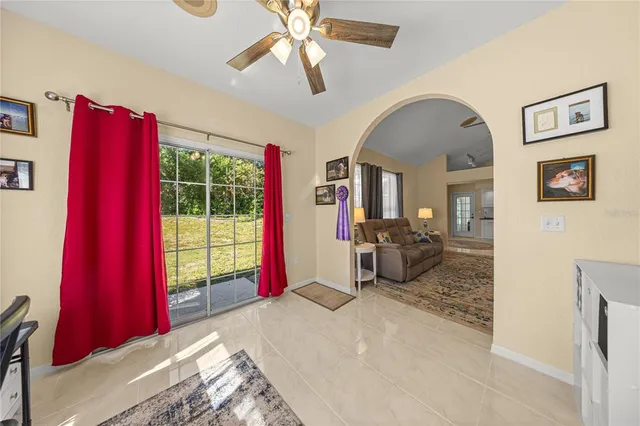 a bedroom with furniture and a window