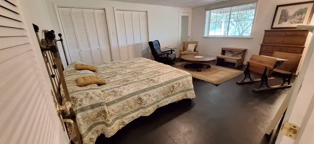 a view of a livingroom with furniture