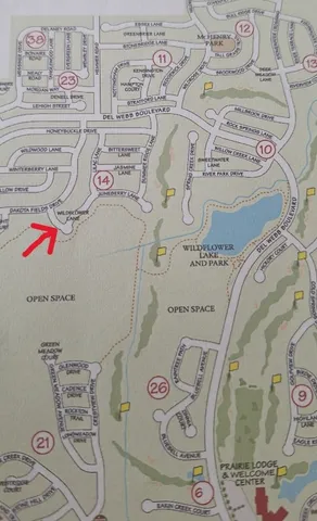 a view of a living room and chandelier