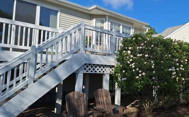 a view of a yard from a balcony