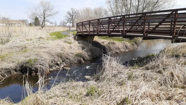 a view of a lake with a yard