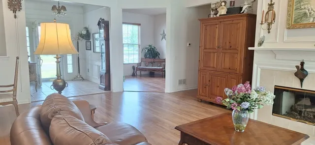 a room with a rug and a mirror