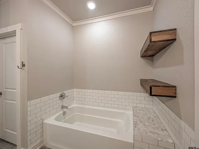 a bathroom with a bathtub