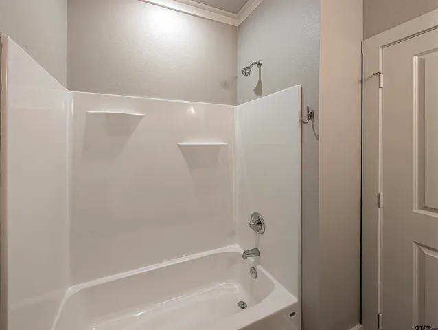 a bathroom with a bathtub